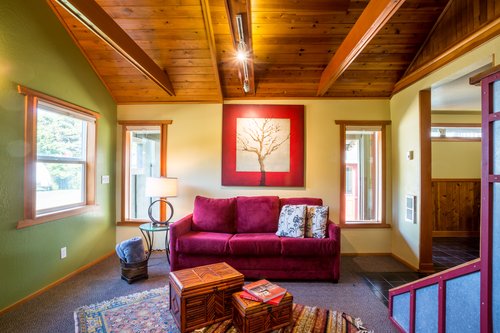 Relax on this cozy sleeper sofa while enjoying a cozy fire in the woodstove