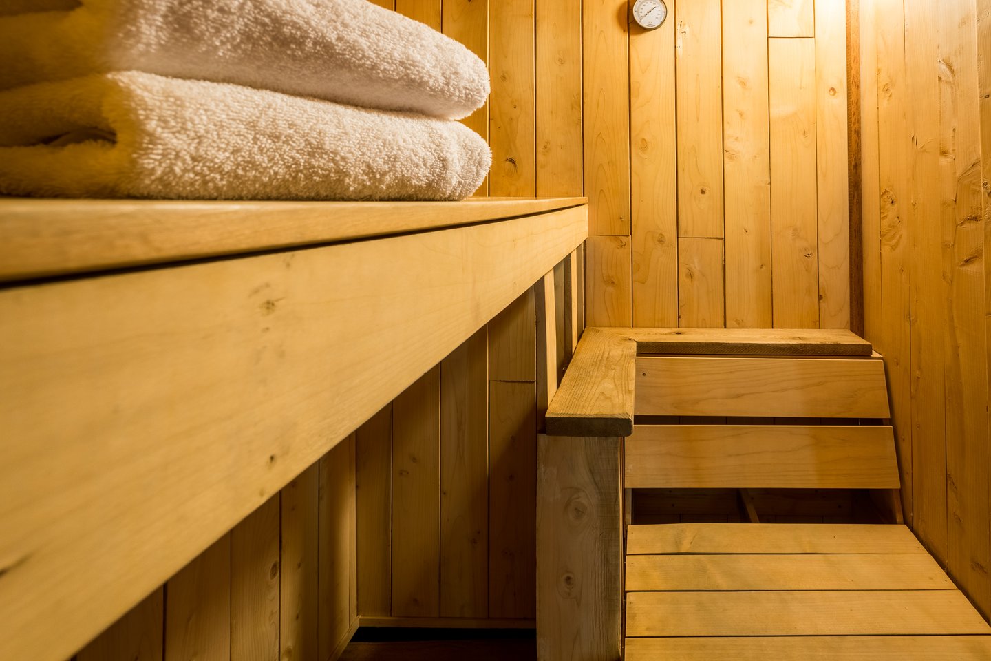Take a seat and enjoy the sauna.