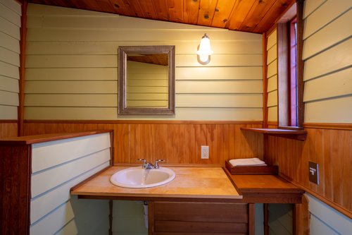 Attached half bath to the primary bedroom.
