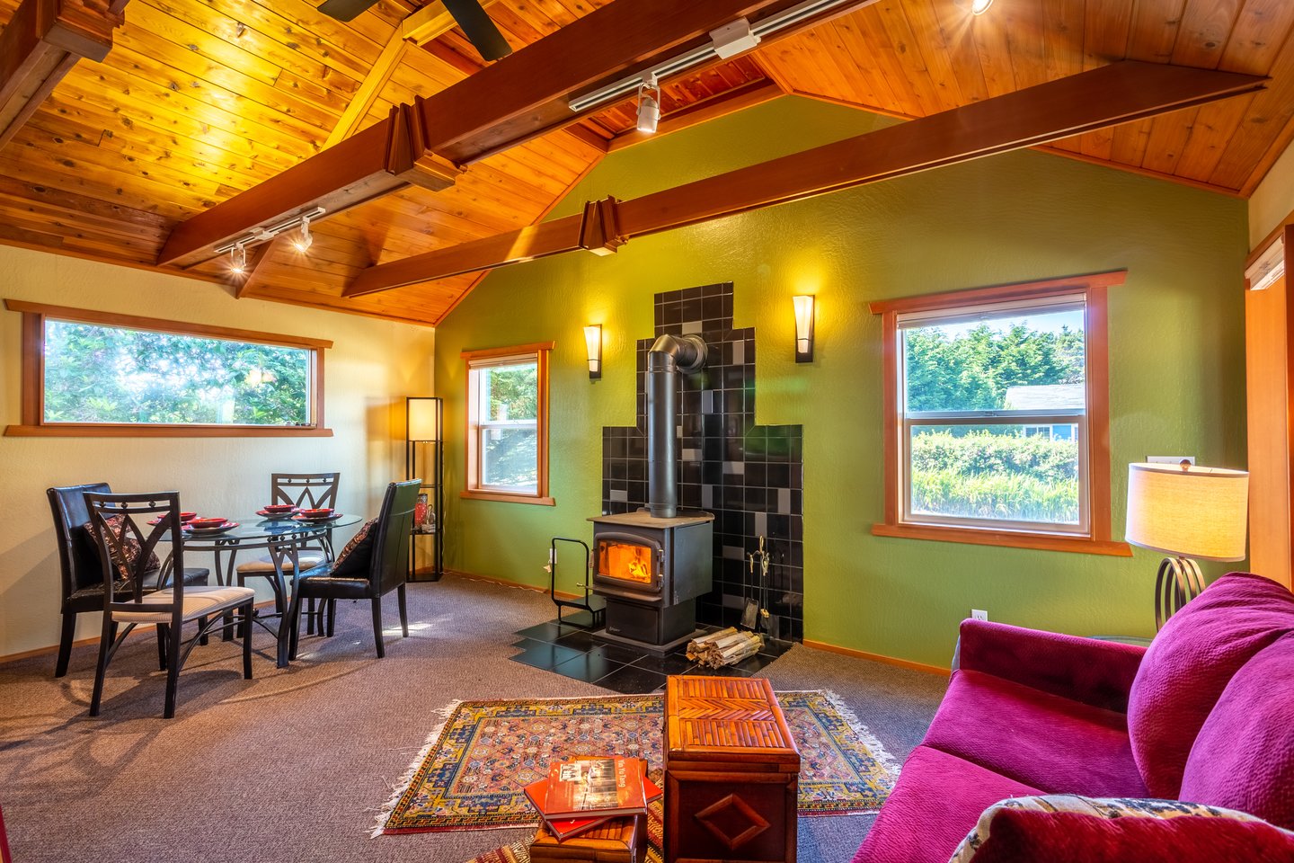 Beam ceilings and colorful accents in a private setting.