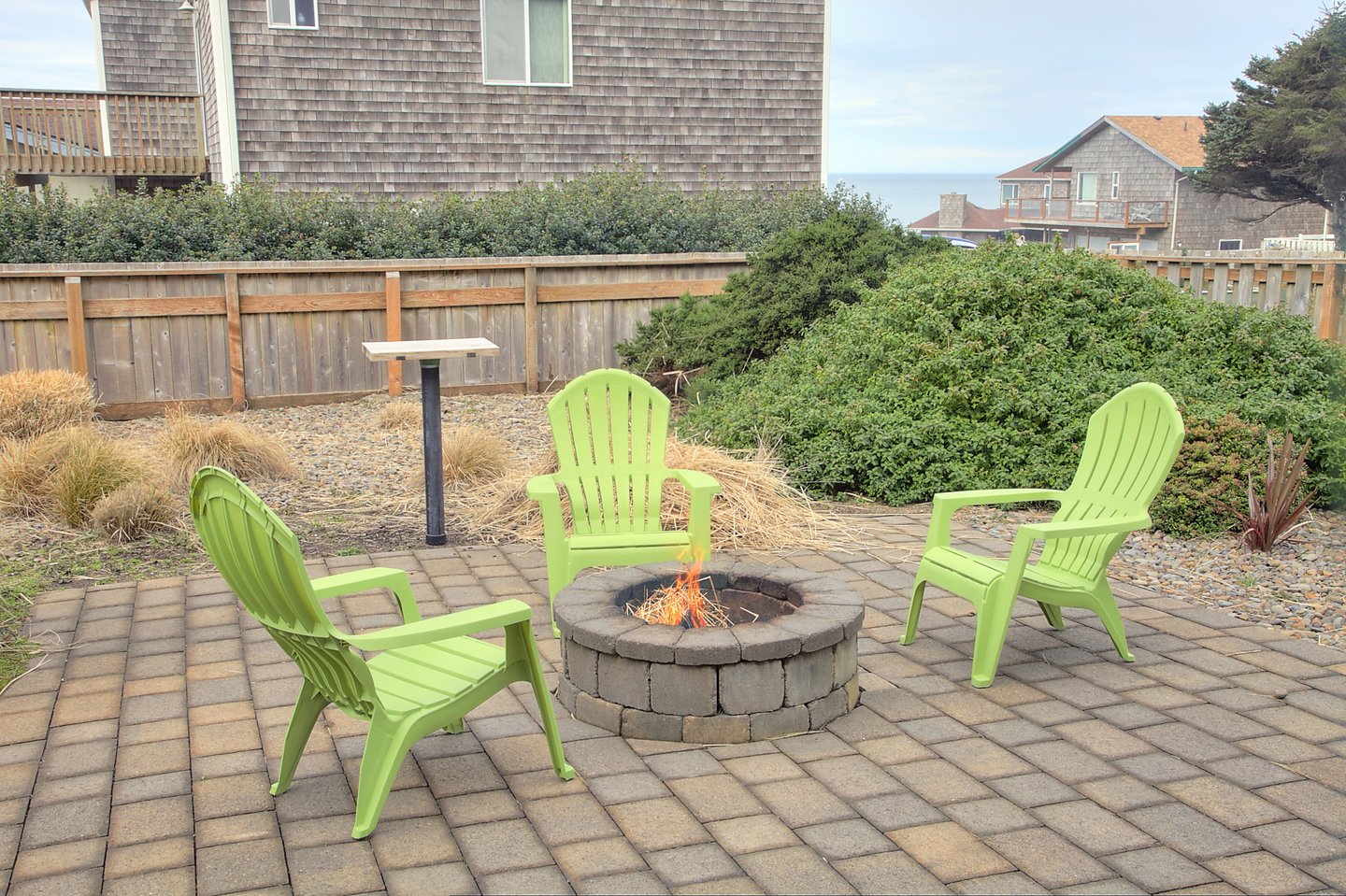 Everyone will gather to enjoy the ocean breezes while seated around the fire-pit.
