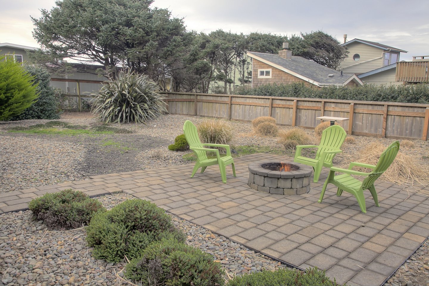 The yard is enclosed for safety and privacy and protection from the wind where you can enjoy the firepit.