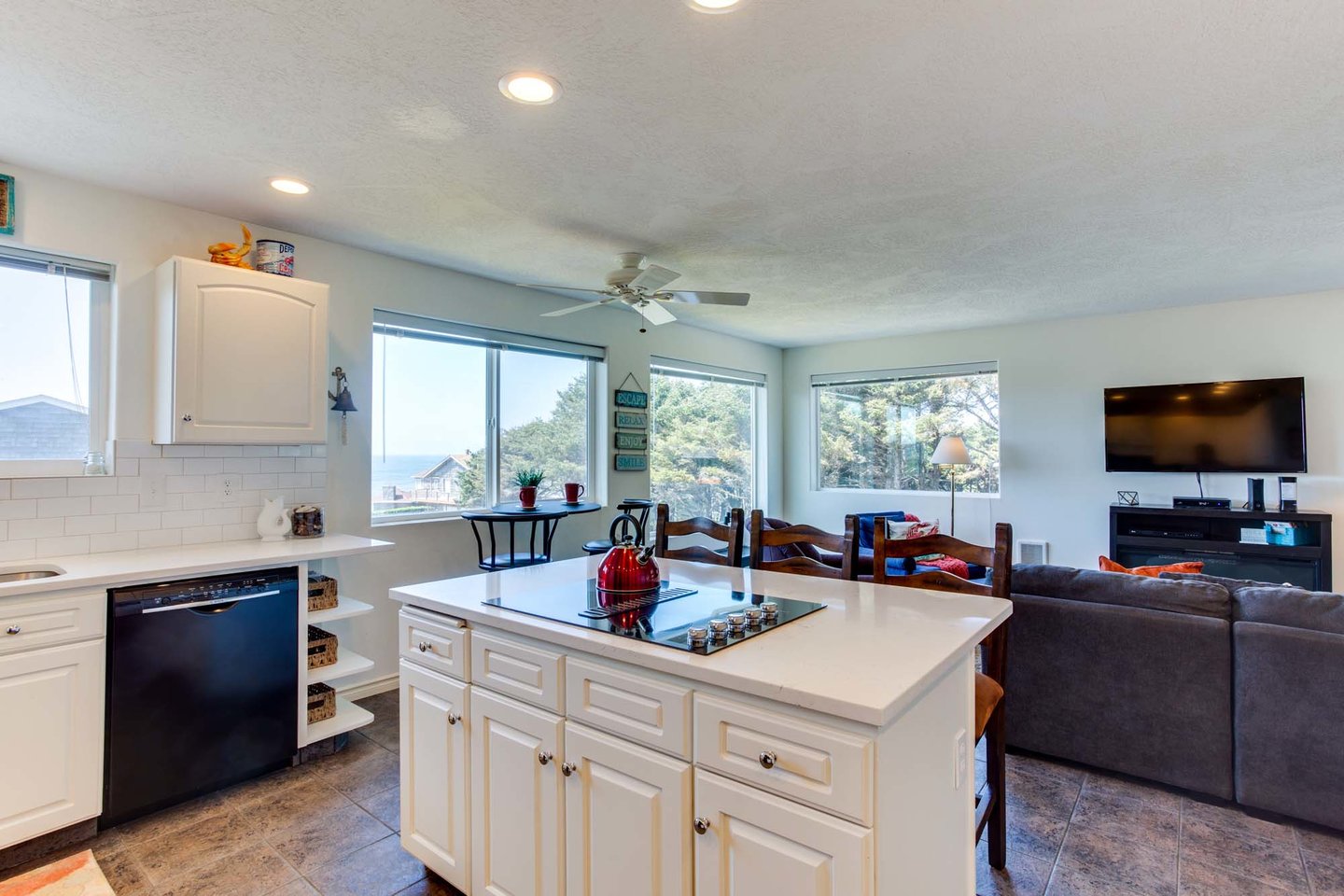 The open concept allows the cook to join in the converstation.