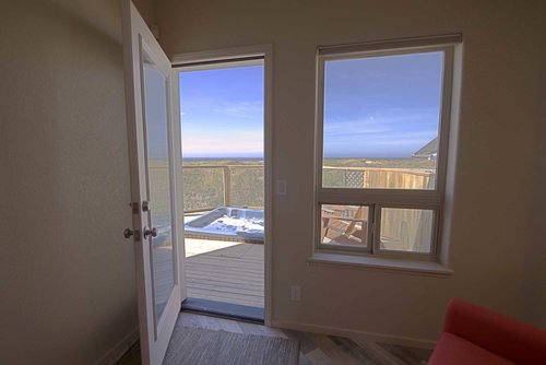 A comfortable and private path to hot tub luxury from the primary bedroom.