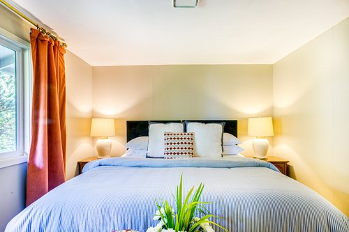 Immaculate linens and colorful design accents.