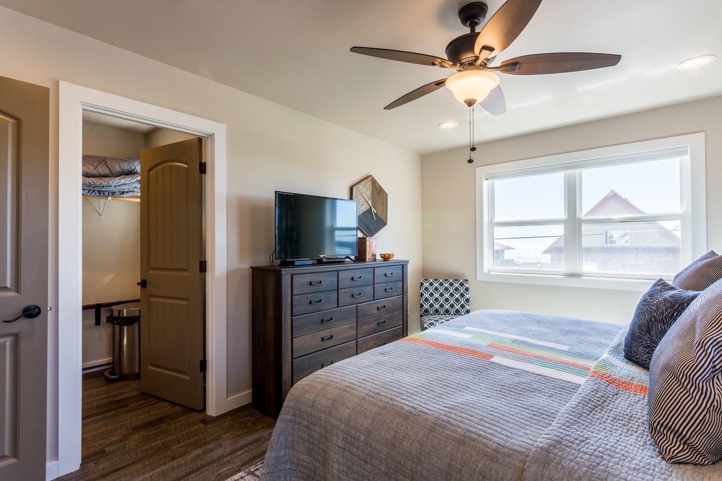 Contemporary furnishings and flat-screen HD TV in this stylish bedroom.