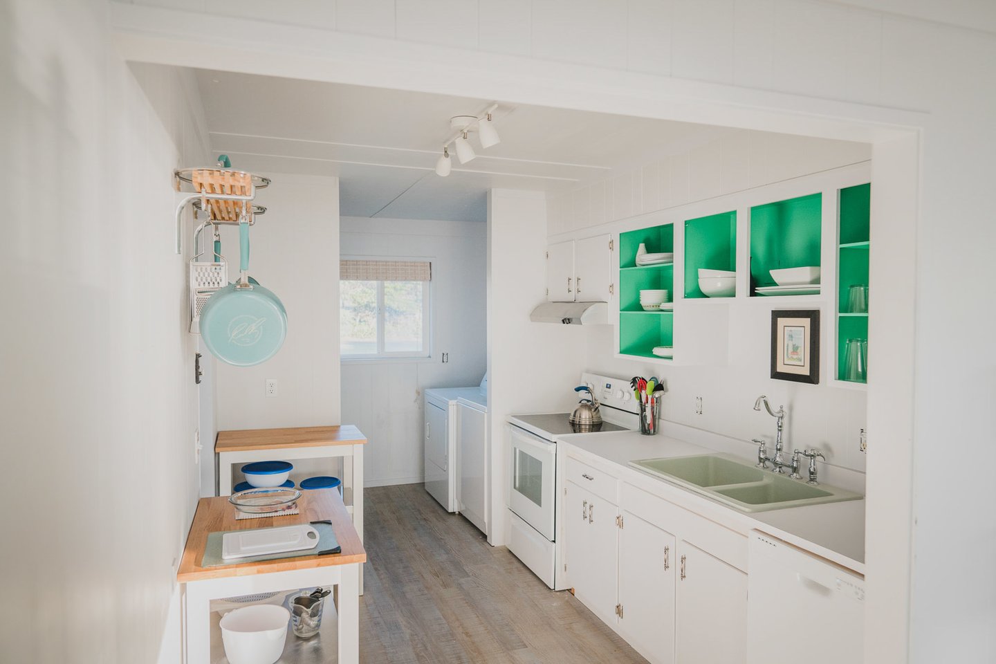 Crisp, clean and simple design makes it easy to create meals in this quaint kitchen.