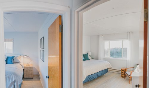 King beds in both bedrooms which share a bathroom.