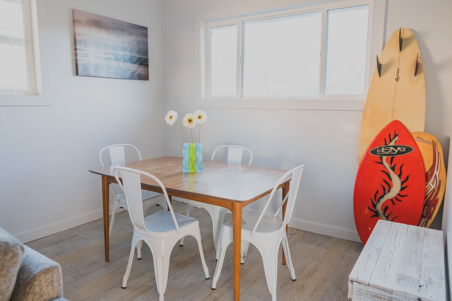 Enjoy family time at the game table or watch television in this cozy den off of the kitchen.