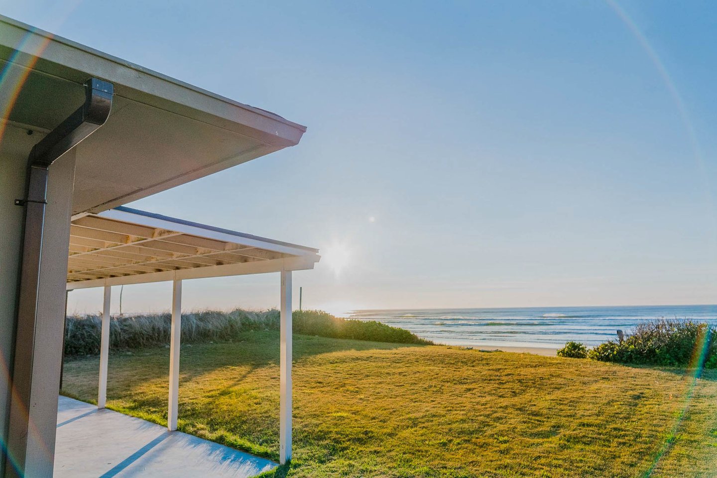 Covered back patio so you can sit outside and enjoy coastal breezes and nightly sunsets.