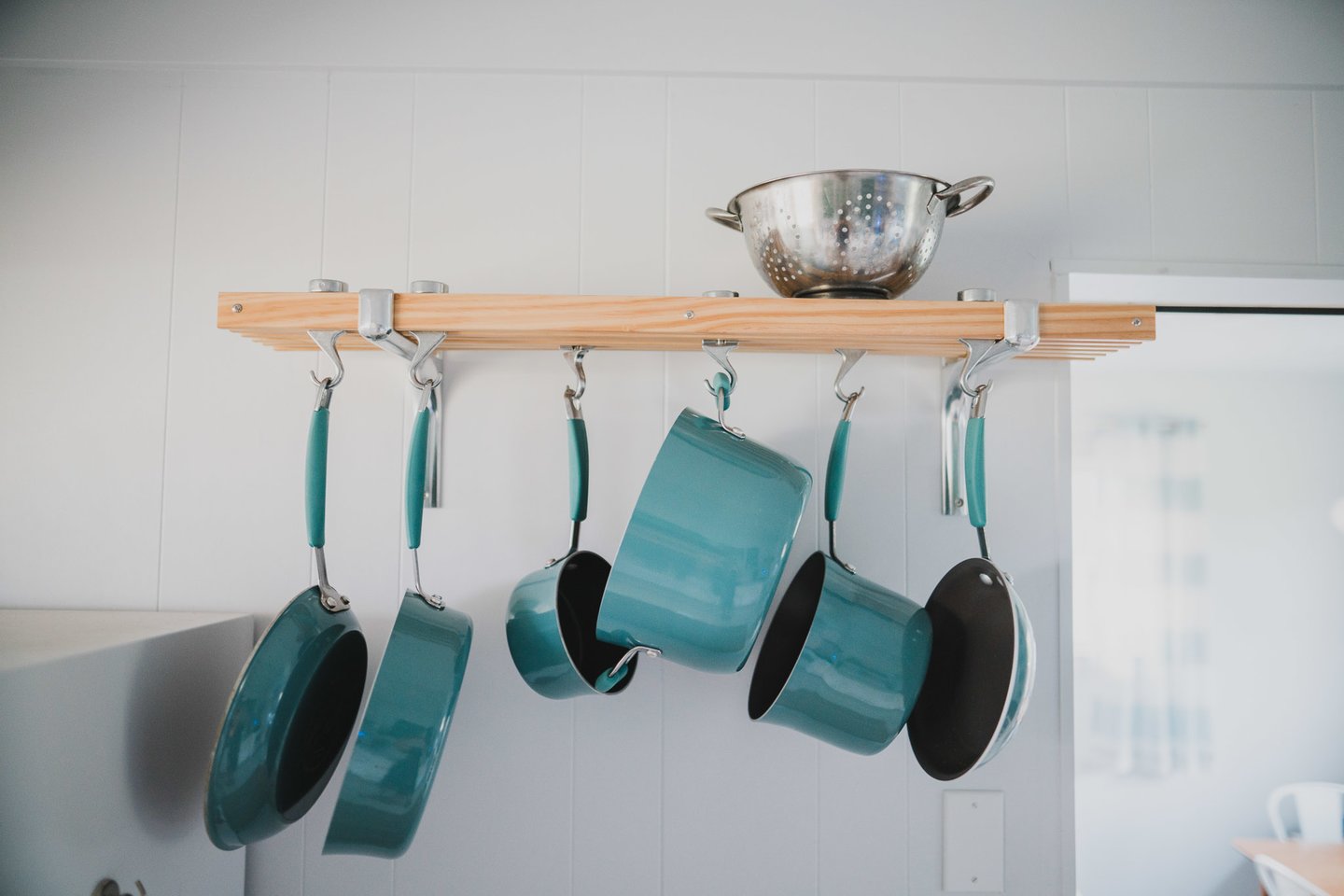 Colorful pots and pans to cook up a savory coastal dish for a hungry group.