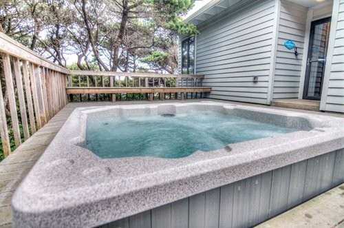 Decompress in the hot bubbly outdoor tub!