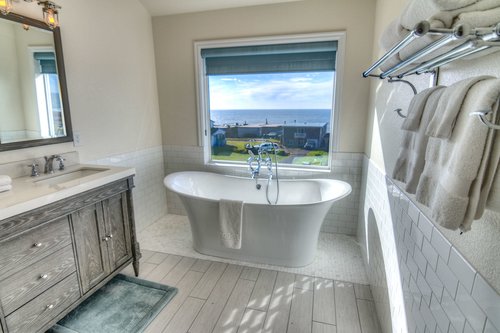 Enjoy this spacious bathroom suite with double vanity and soaking tub.