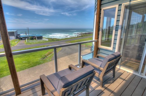 Enjoy outdoor/indoor living under the covered deck off of the dining room.