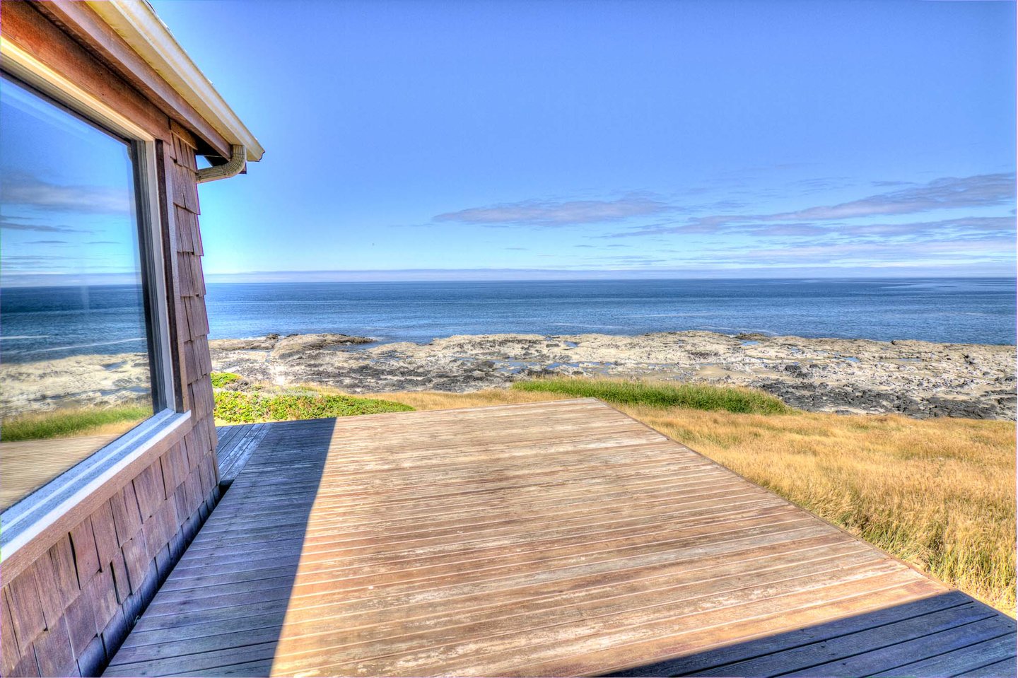 The deck is the perfect spot to enjoy a sunny day and watch the birds and sea lions on the rocks.
