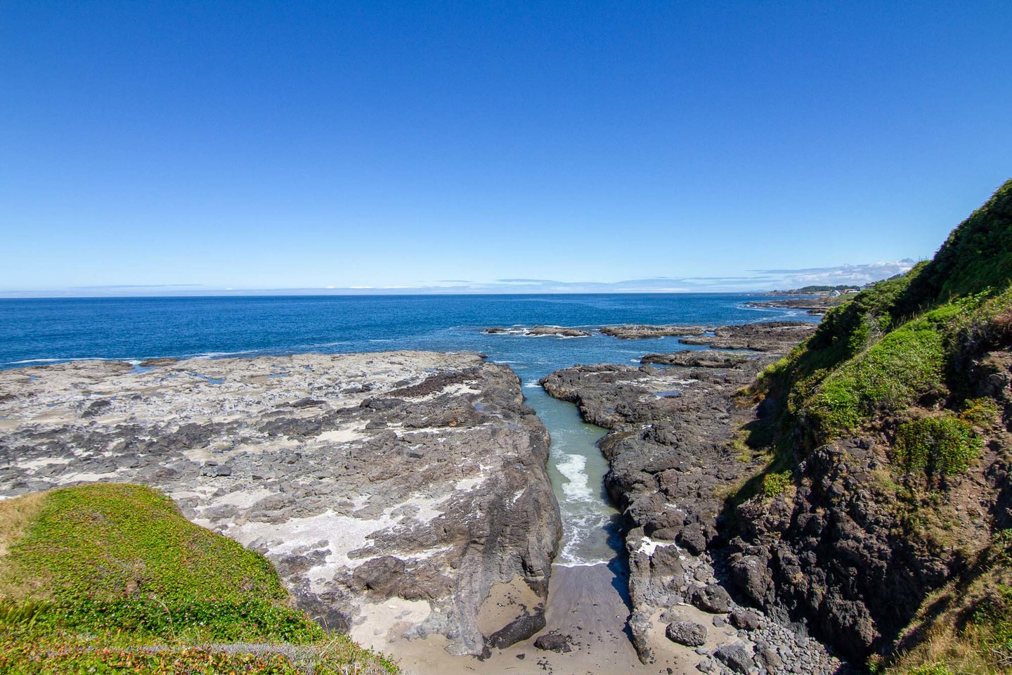The house sits on a bluff where you can watch the tides ebb and flow through this canal.