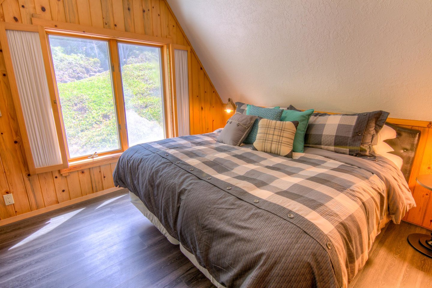 The fourth bedroom is tucked in to a cozy spot upstairs. The king bed can be split in to 2 twins with prior notice.