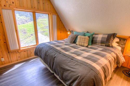The fourth bedroom is tucked in to a cozy spot upstairs. The king bed can be split in to 2 twins with prior notice.
