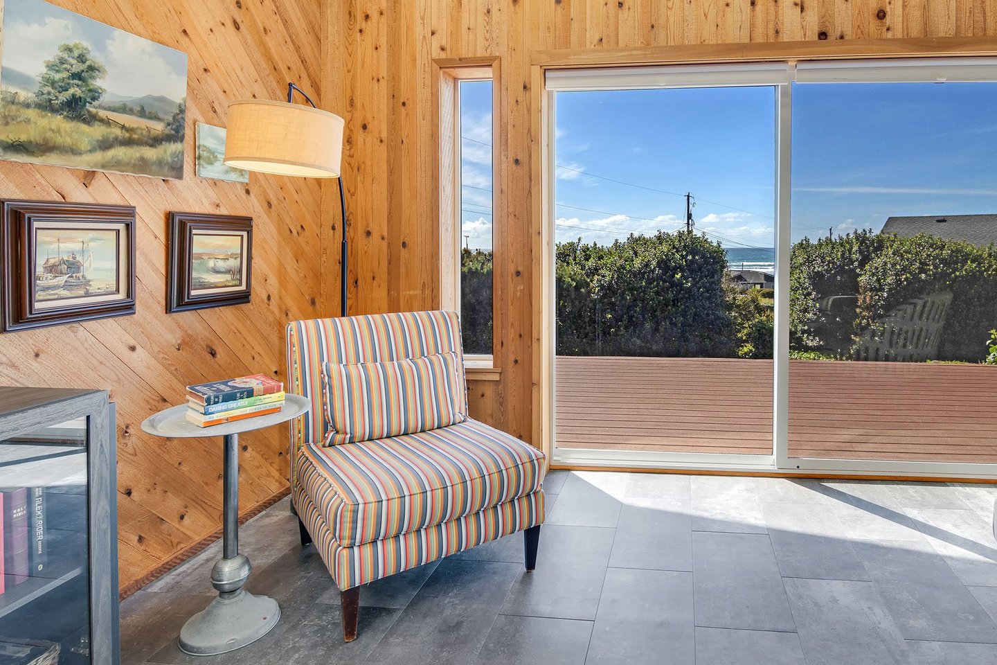 Sliding glass doors make it easy to enjoy ocean breezes.