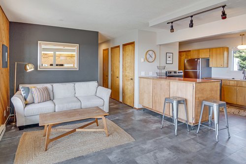 The sleeper sofa tucked in to this space allows for extra sleeping space and a quiet corner to read a good book!