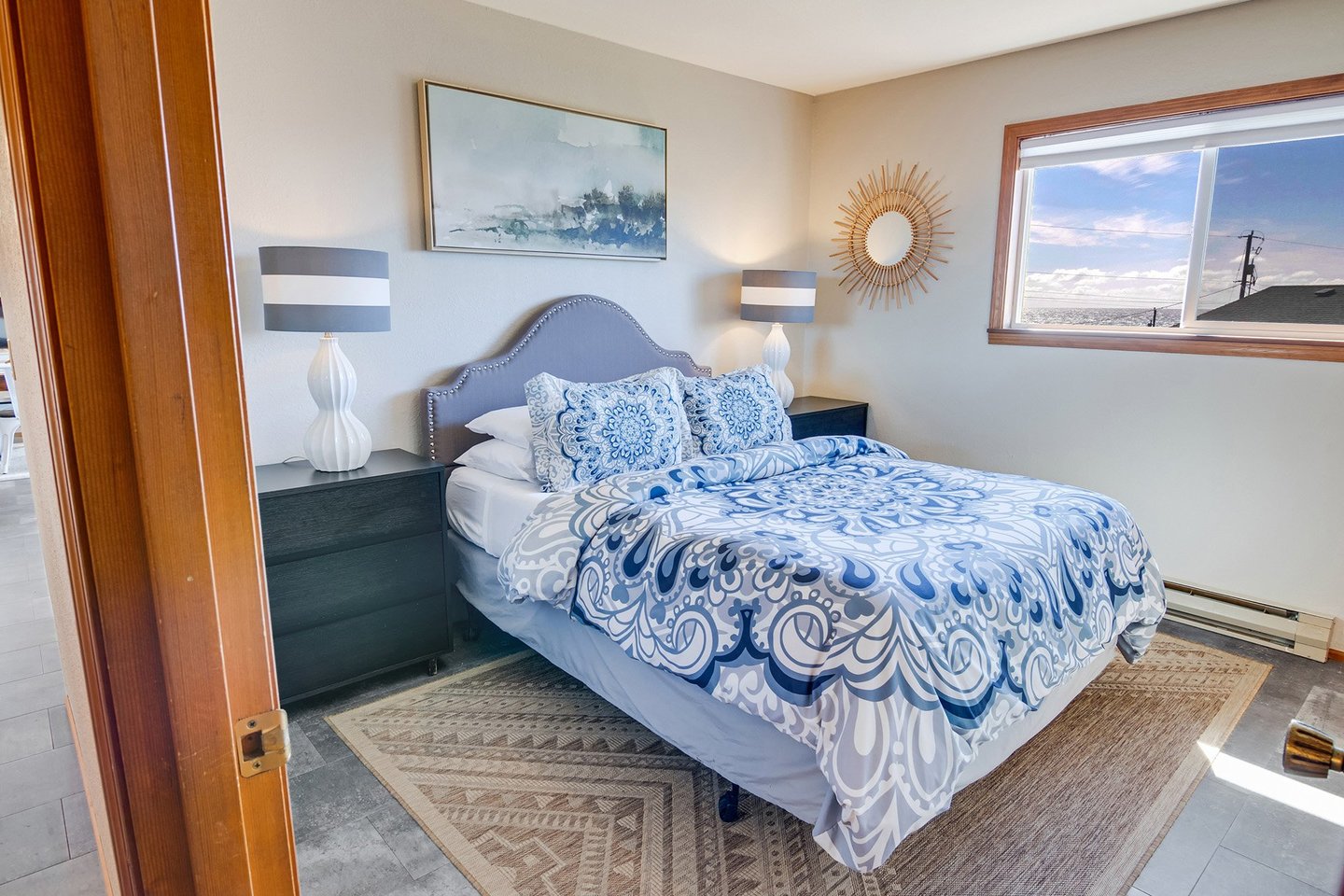Enjoy the ocean view from this bedroom.