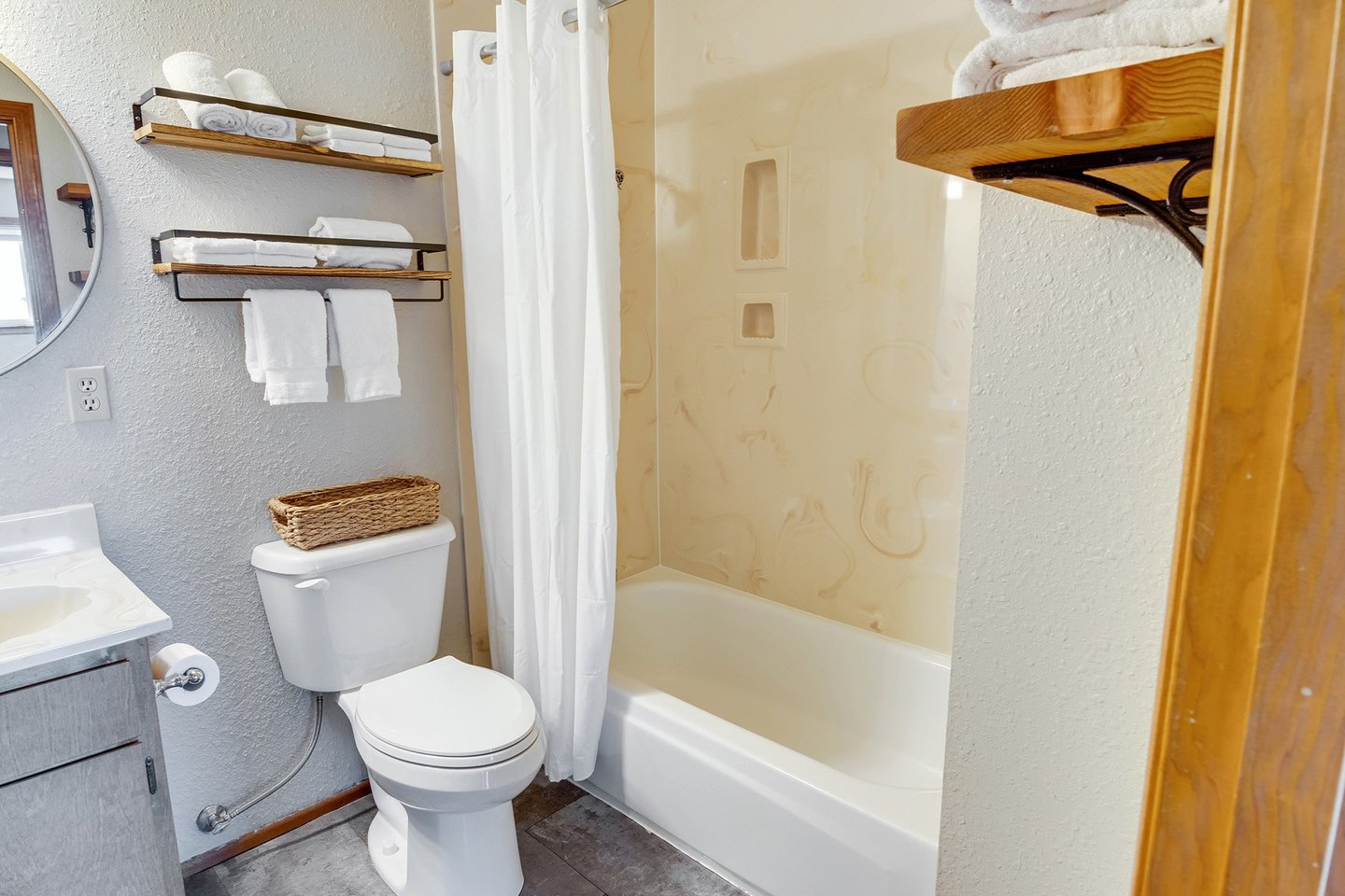 The shared bath has a tub.