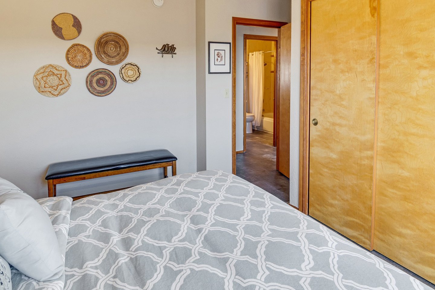 There is a shared bath right across the hall.