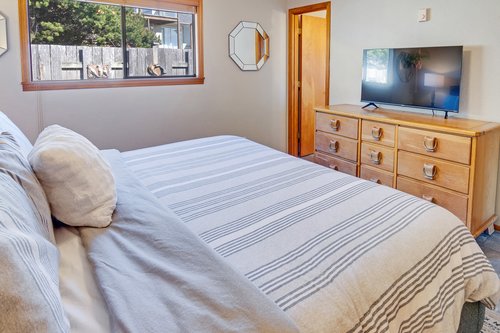 Watch late night television from the comfort of bed.