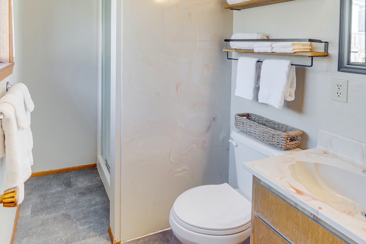 A bathroom with shower attached to the primary bedroom allows for some extra privacy.