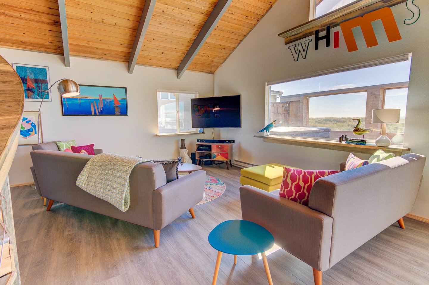 Watch the ocean or television in this comfortable living space.