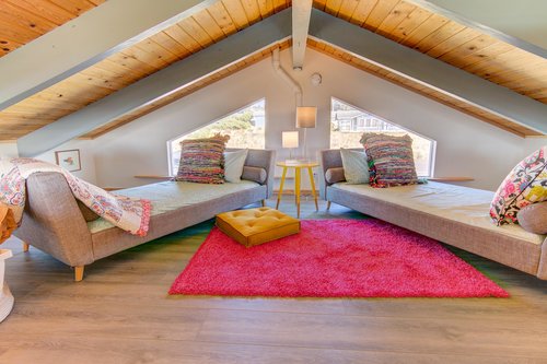 The loft provides extra sleeping on two twin daybeds.
