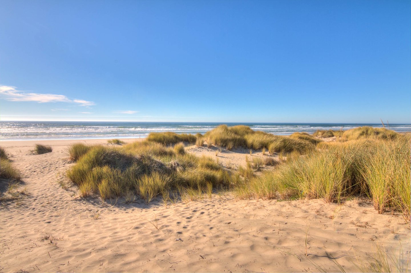 Wander over the dunes to miles of sandy beach.