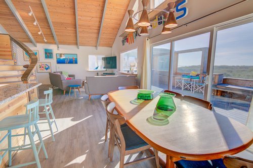 A lot of windows let the light in to the open concept living area.