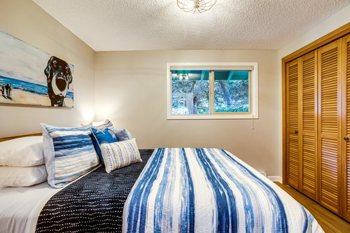 Comfy queen bed in the second bedroom.