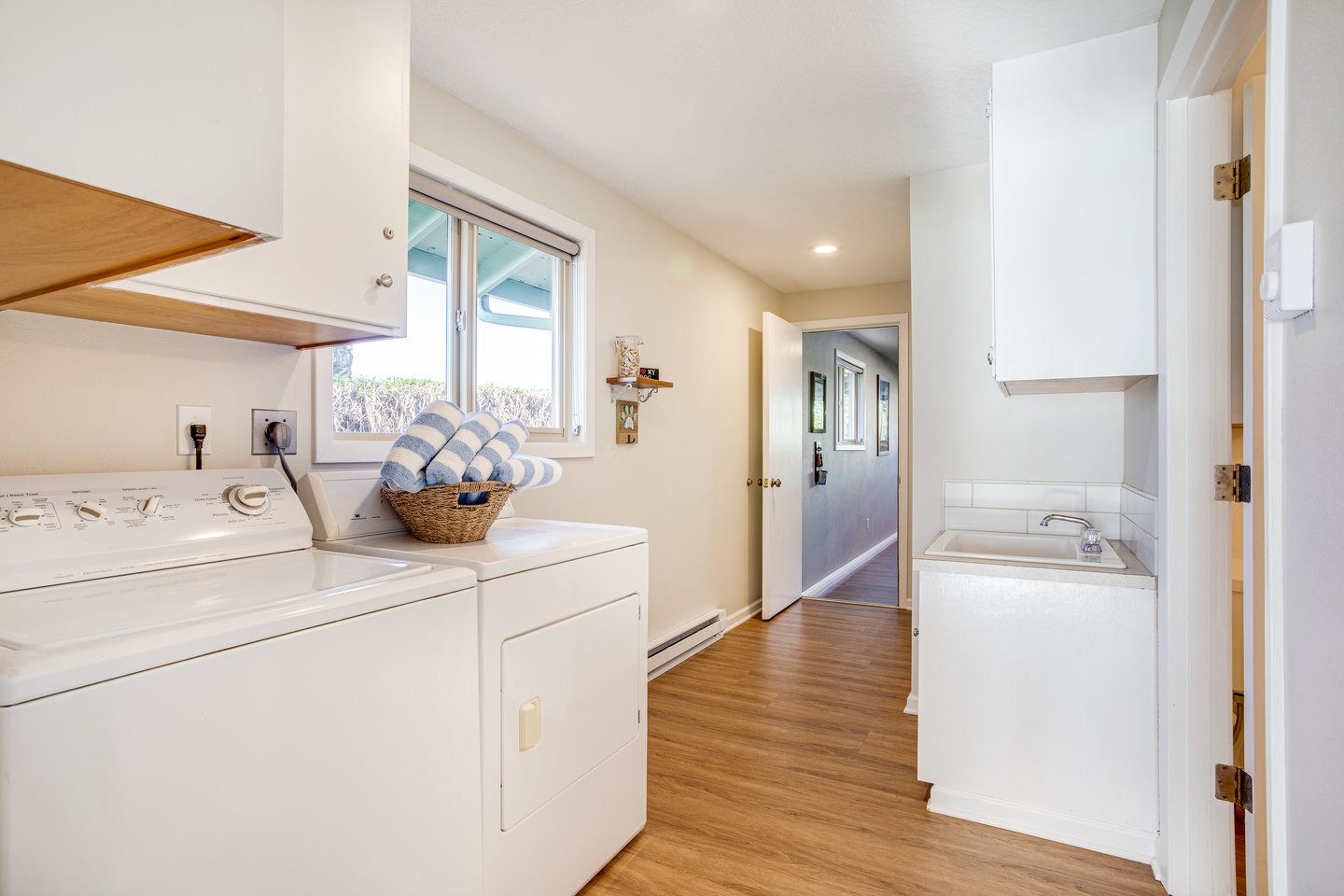 Laundry room with a washer/dryer for convenience.