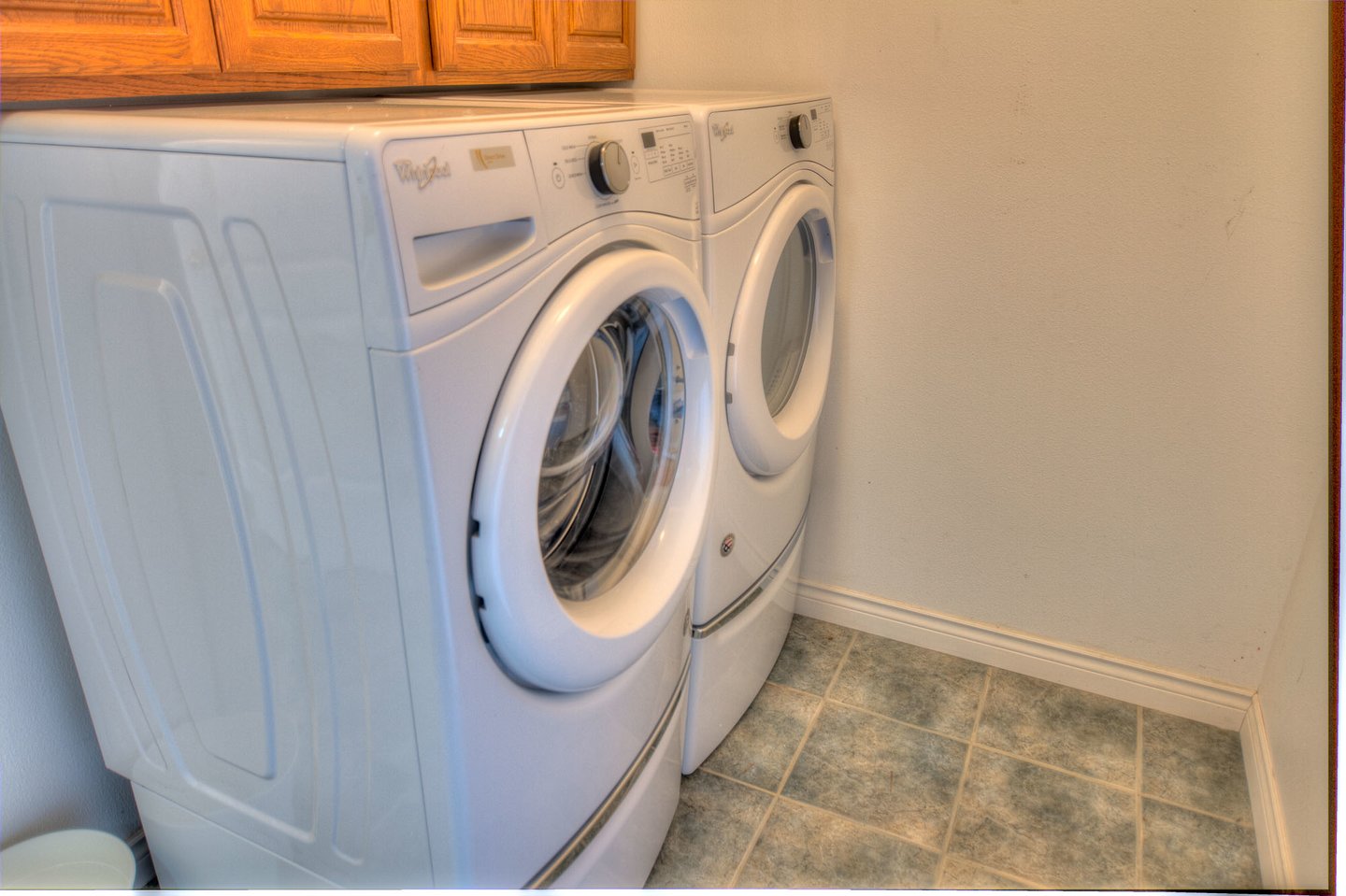 Washer and dryer in laundry room.