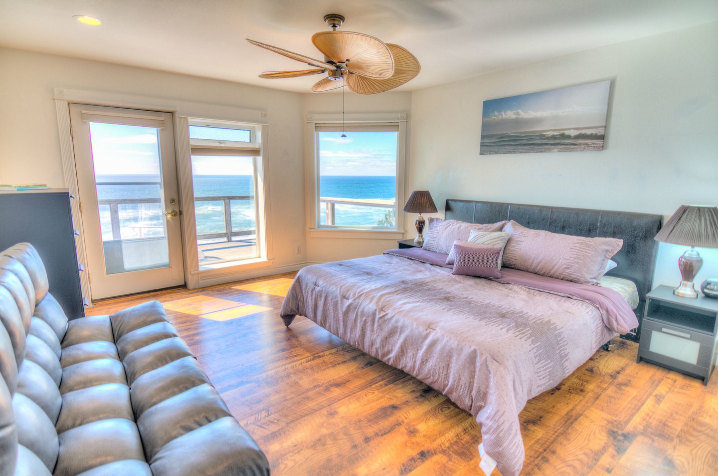 Second floor bedroom 2 with king bed. Also has a twin futon and deck access.