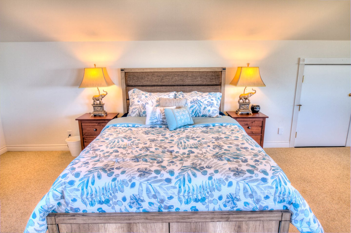 Second floor bedroom 4 with a queen bed.