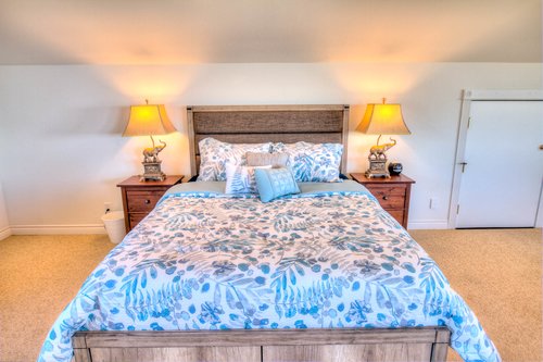 Second floor bedroom 4 with a queen bed.