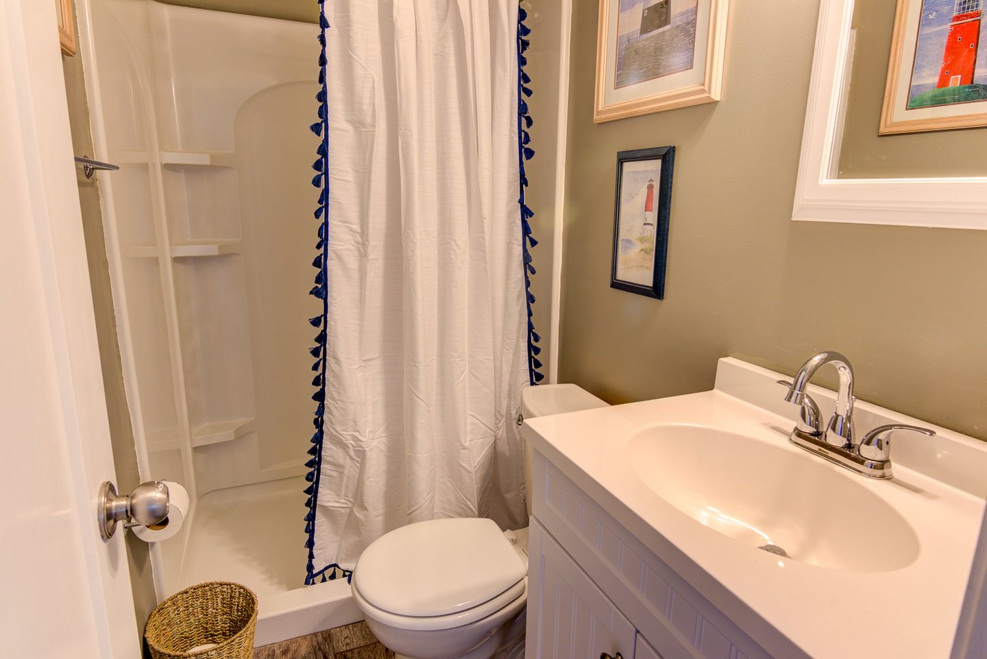 Downstairs is a full bathroom.