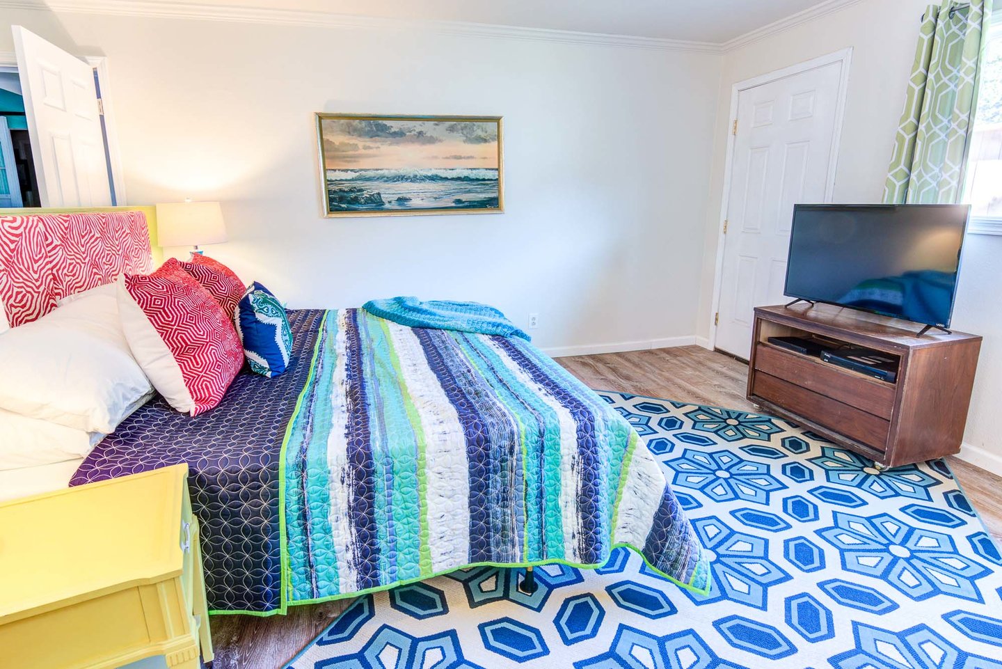 Escape to watch a good movie in the primary suite with its own exterior entrance.