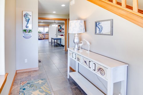 Enter into your sun-soaked home on the lower level.