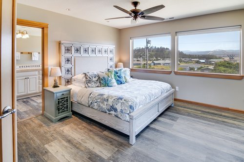 The master suite, with a king bed, has fabulous views of the Alsea Bay Bridge.