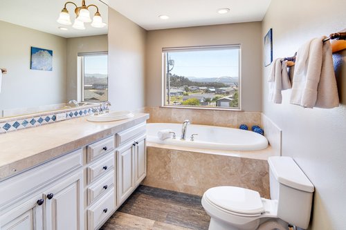 The master suite has a soaking tub with views of the bay bridge.