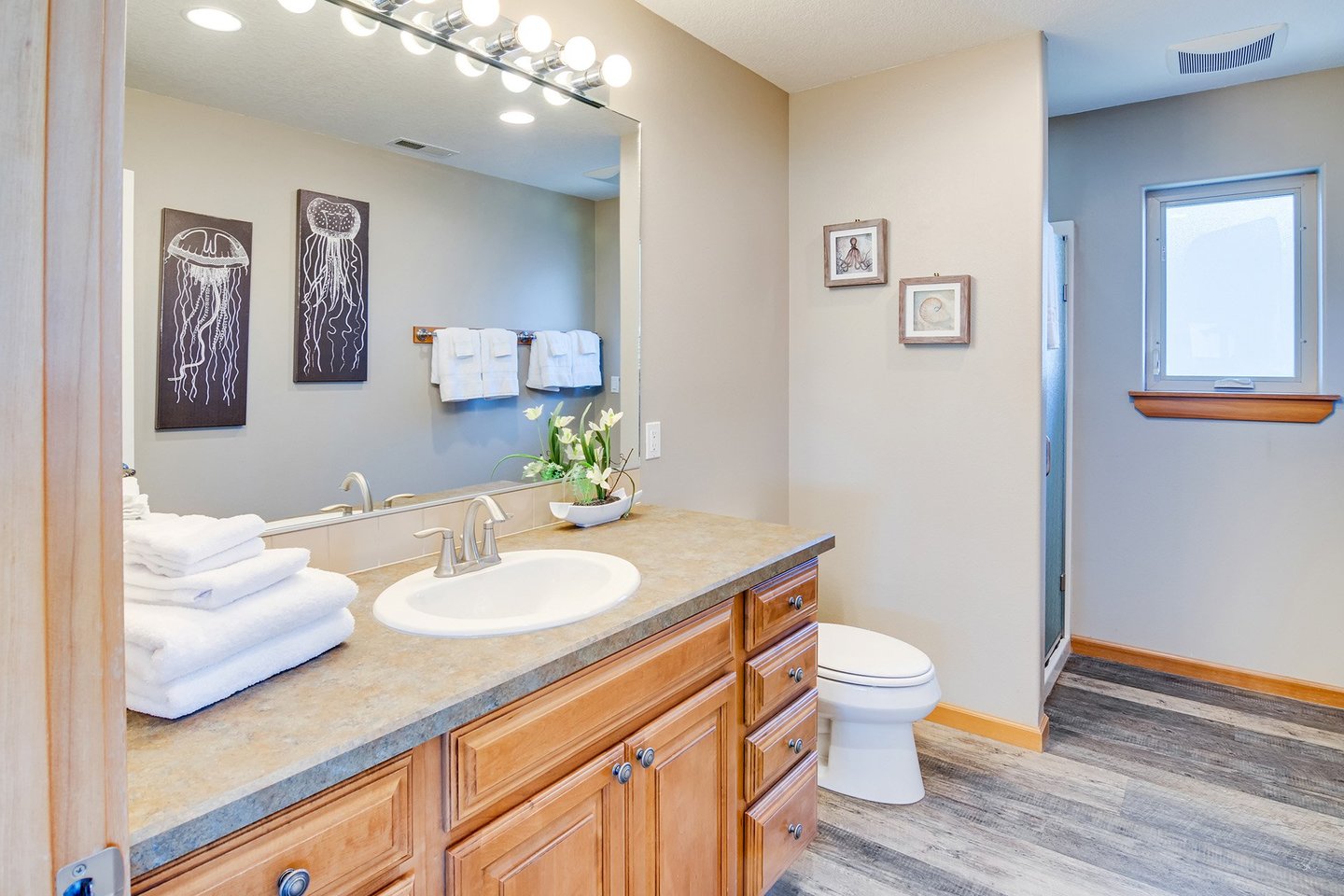 One of 4 bathrooms with a walk in shower.
