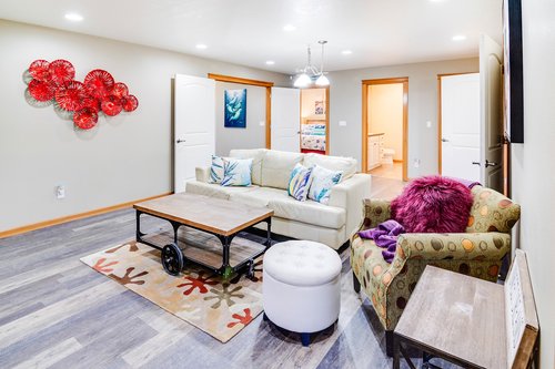 This large family room has a sleeper sofa for extra bedding options.