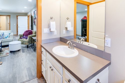 There is a convenient half bath off of the family room.