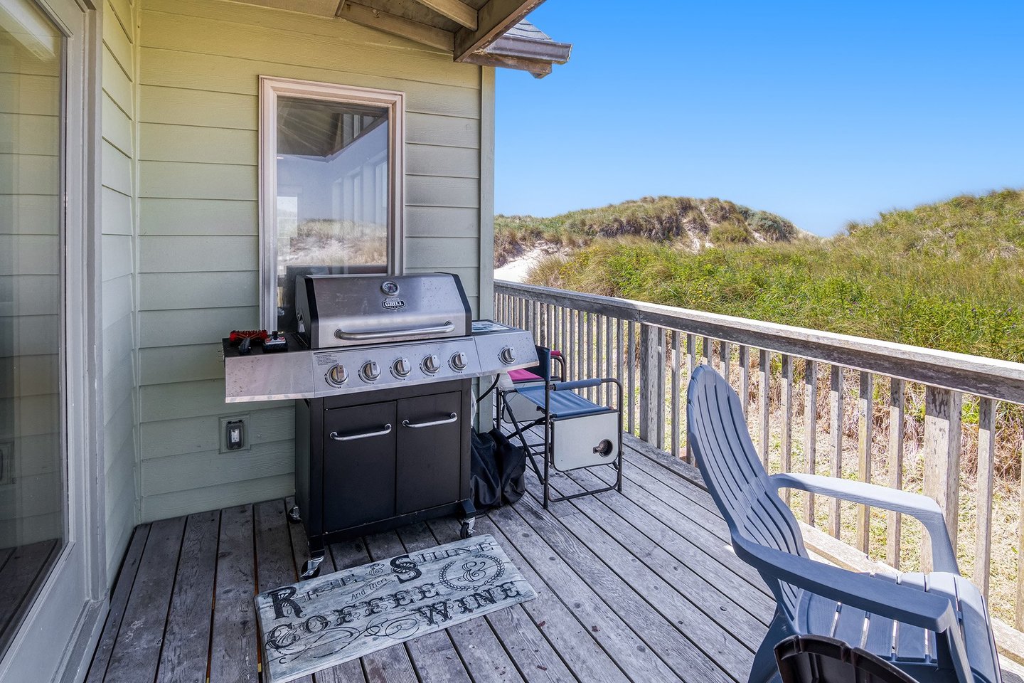 Fire up the gas BBQ grill on the ocean view deck.