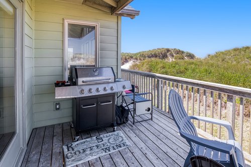 Fire up the gas BBQ grill on the ocean view deck.
