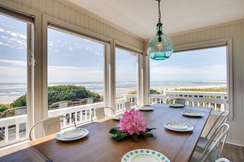Large table with fantastic views of Alsea Bay or the Pacific Ocean.